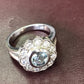 ZAJ15 Anillo Flor Aguamarina Diamantes Engaste Invisible Oro Blanco